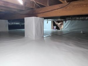 Crawl space encapsulation in Greenfield IN with sealed vapor barrier and clean waterproofed floor